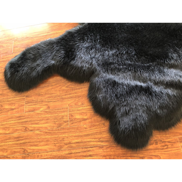 Millwood Pines Voorhees Machine Woven / Power Loomed Faux Fur Black Rug
